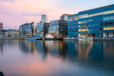 A stunning malmo city skyline featuring a beautiful body of water in the foreground