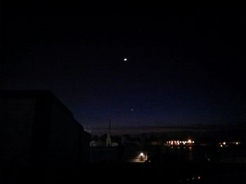 Illuminated cityscape at night