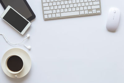 Directly above shot of coffee cup on table