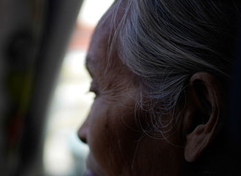 Close-up of senior woman with gray hair