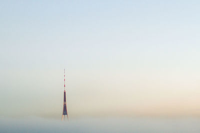 Tower against clear sky during sunset