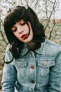 Close-up of woman looking down