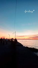 Scenic view of beach against sky during sunset