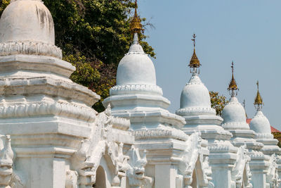 Temple against building