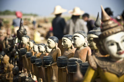 Close-up of statues in row