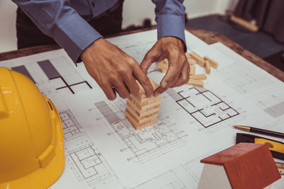 Midsection of man working at office