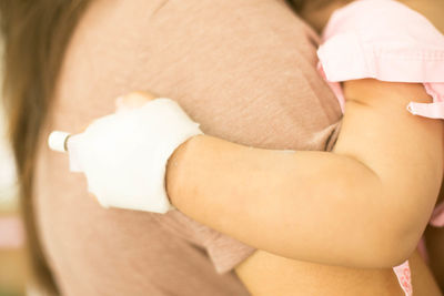 Close-up of woman holding hands