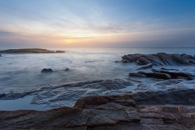 Scenic view of sea against sky during sunset