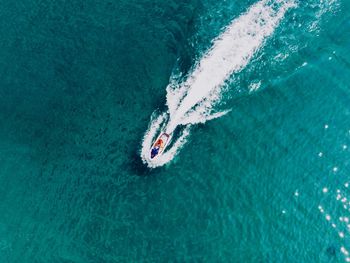 High angle view of people in sea