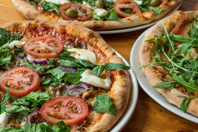 Close-up of pizza served on table