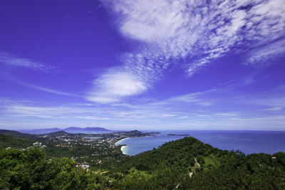 Scenic view of landscape against blue sky