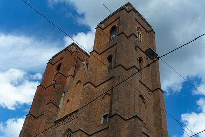 Low angle view of old building against sky