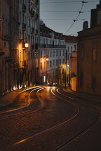 Illuminated street at night