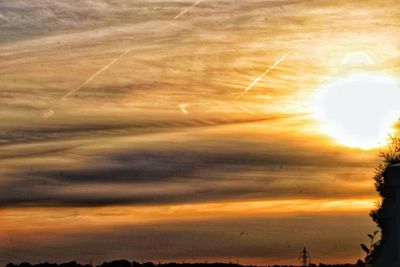 Low angle view of dramatic sky during sunset