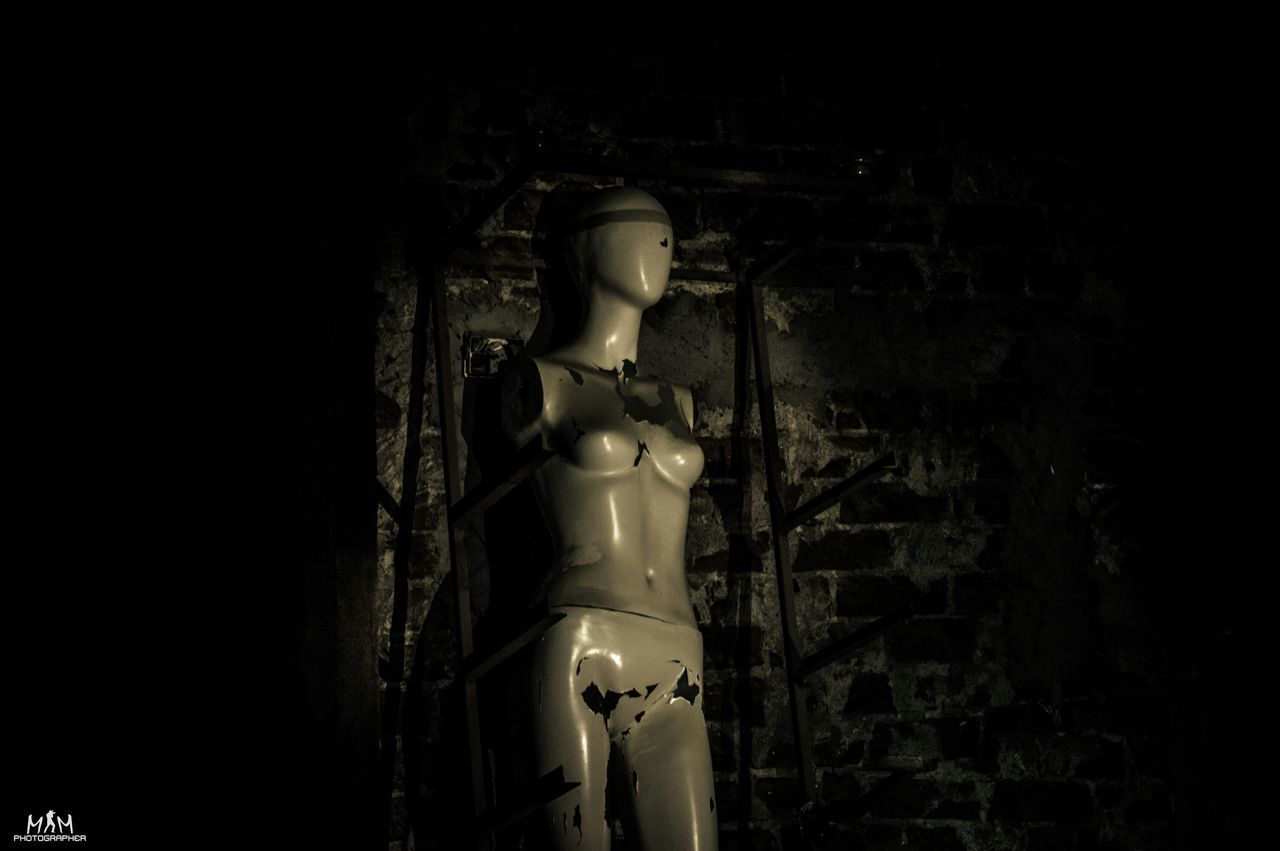 human representation, statue, spirituality, religion, art and craft, sculpture, place of worship, no people, night, indoors, illuminated, architecture, close-up