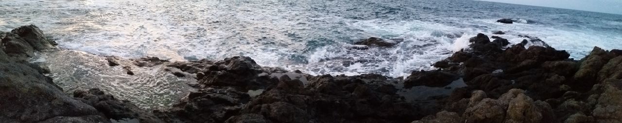 Panoramic view of sea and rocks