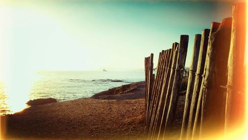 Scenic view of sea at sunset