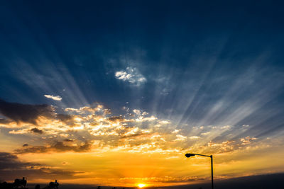 Low angle view of dramatic sky during sunset