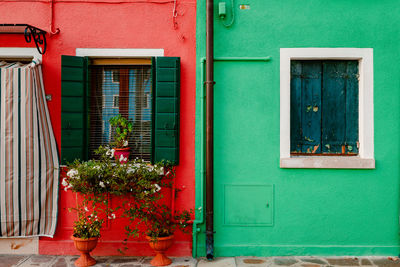 Characteristic red and green colored houses in burano