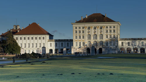 Facade of historic building against sky