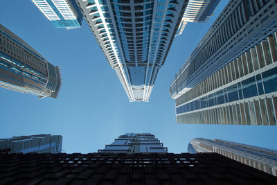 Low angle view of modern buildings in city, dubai marina