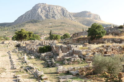 Built structure on mountain against the sky