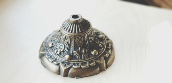 High angle view of carvings on table