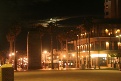 Illuminated street light at night