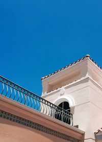 Low angle view of built structure against blue sky