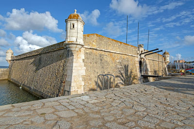 View of fort against cloudy sky