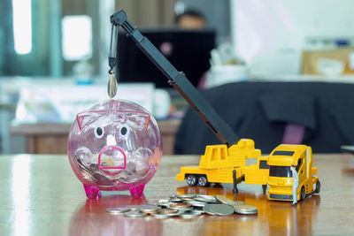 Close-up of piggy bank on table