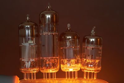 Close-up of wine bottles on table