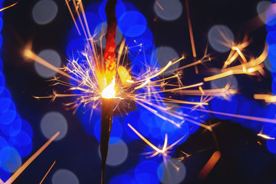 Close-up of illuminated firework display at night