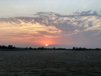 Scenic view of silhouette landscape against sky during sunset