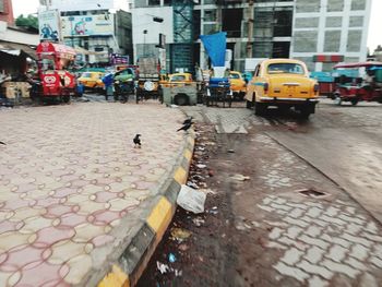 View of wet street in city