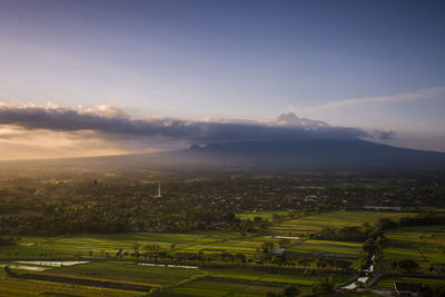 Aerial view of agricultural landscape against sky