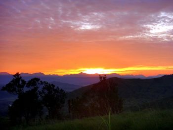 Scenic view of mountains against sky during sunset