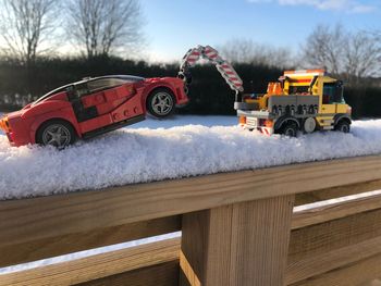 View of toy car against sky during winter