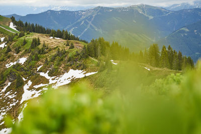 Scenic view of snowcapped mountains against sky