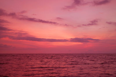 Fantastic gradient pink and purple seascape at tropical sunset