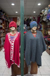 Full length of woman standing in store