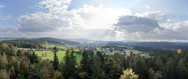 Panoramic view of vineyard against sky