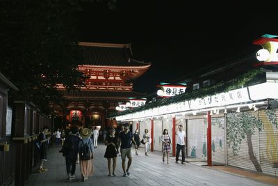 People in front of building