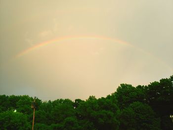 Low angle view of rainbow against sky