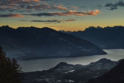 Scenic view of mountains against sky during sunset