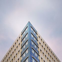 Low angle view of modern building against clear sky