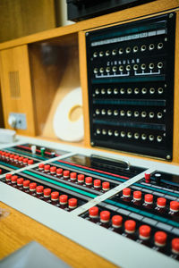 Close-up of piano keys on table