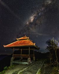 Gazebo against star field sky at night