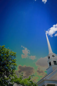 Low angle view of building against blue sky