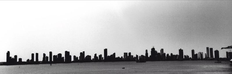 View of city skyline against clear sky